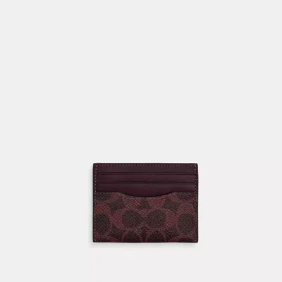 Coach Slim Id Card Case In Signature Canvas In Red