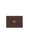 Coach Solid Color Leather Card Holder In Brown