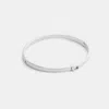 Coach Thin Signature Hinged Bangle In Silver