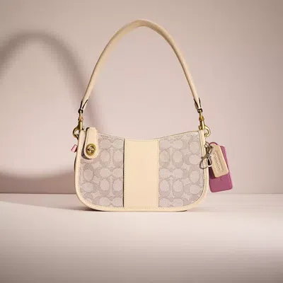 Coach Upcrafted Swinger Bag In Signature Jacquard In Brass/stone Ivory