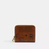 Coach X Peanuts Essential Billfold Wallet With Newspaper Print