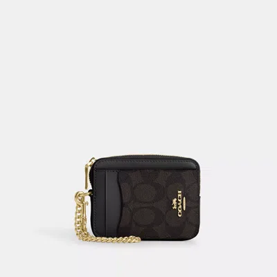 Coach Zip Card Case In Signature Canvas In Beige