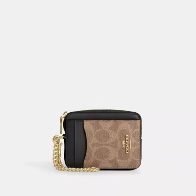 Coach Zip Card Case In Signature Canvas In Beige