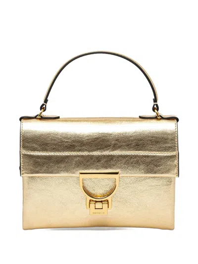 Coccinelle Arlettis Cross Body Bag In Gold
