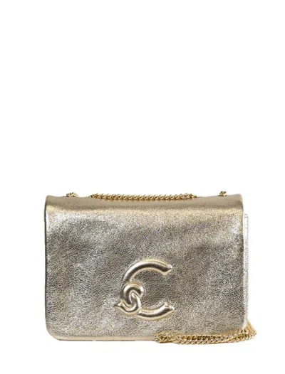 Coccinelle Bags.. In Gold