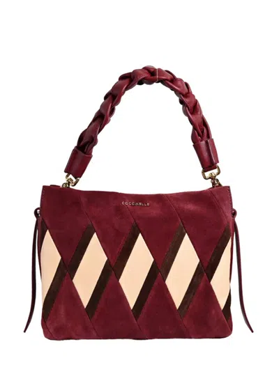 Coccinelle Bags.. In Purple
