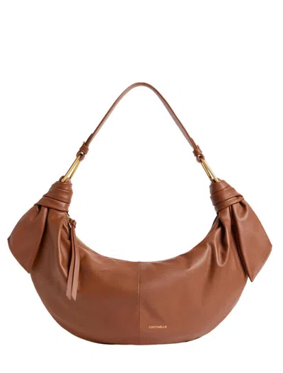 Coccinelle Bags.. Brandy In Brown