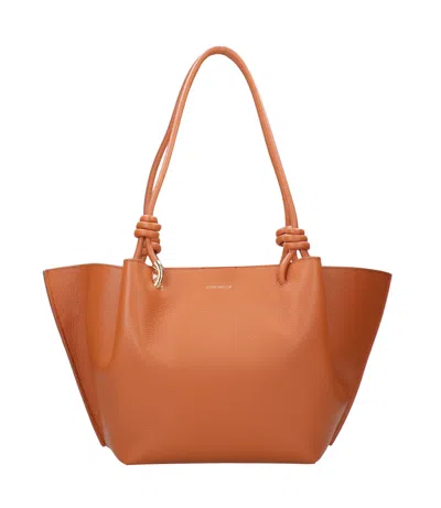 Coccinelle Bags.. Clay In Brown