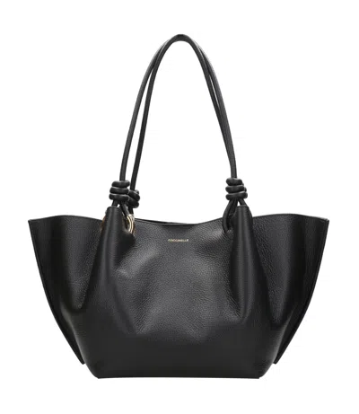 Coccinelle Bags.. In Black