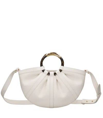 Coccinelle Bags.. In White