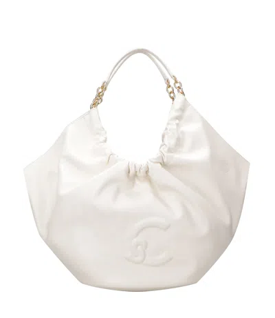 Coccinelle Bags.. In White