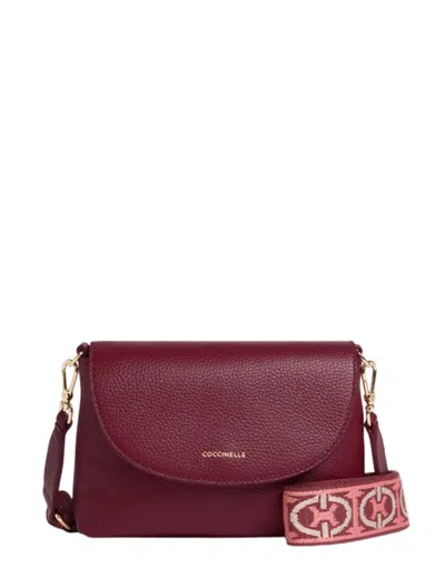 Coccinelle Bags.. In Red