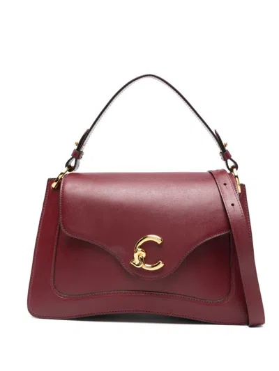 COCCINELLE COCCINELLE RED HANDBAG  FEATURING A DETACHABLE TOP HANDLE