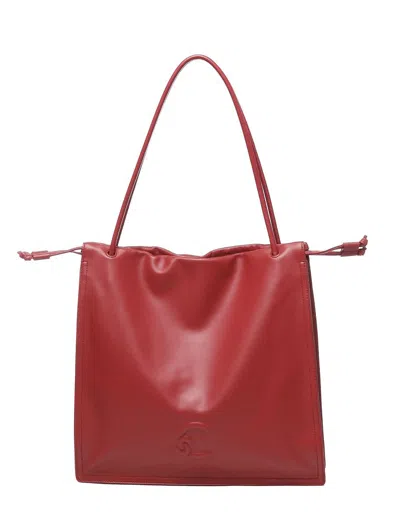 Coccinelle Logo Embossed Drawstring Tote Bag In Red