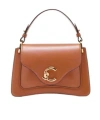 Coccinelle C-me Flip Shoulder Bag In Brown