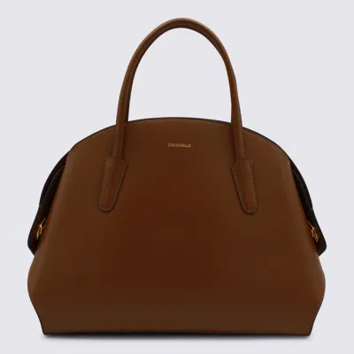Coccinelle Cognac Leather Tylde Top Handle Bag In Brown