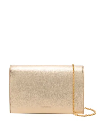 Coccinelle Dandy Clutch Bag In Gold
