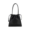 Coccinelle Black Vitello Leather Handbag With Drawstring Closure
