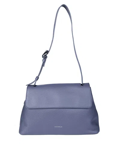Coccinelle Fern Pebbled Rectangular Shoulder Bag In Blue