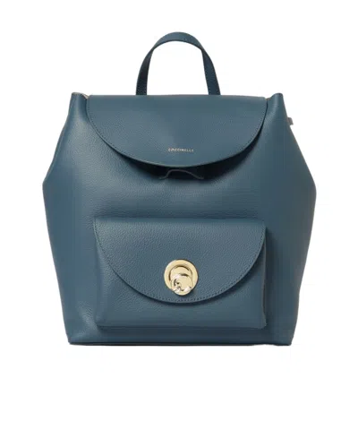 Coccinelle Flap Backpack. In Blue