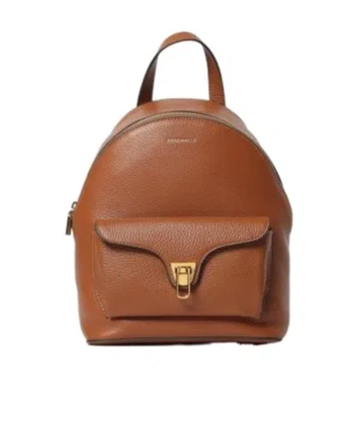 Coccinelle Flap-pocket Zip Backpack In Orange