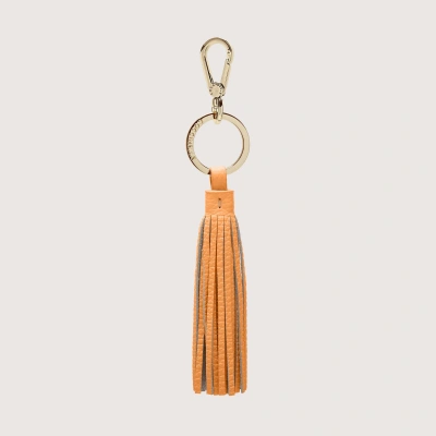 Coccinelle Grained Leather And Metal Key Ring Tassel In Sunrise