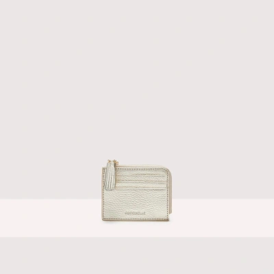 Coccinelle Grainy Leather Card Holder Tassel In Pale Gold