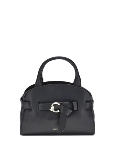 Coccinelle Handbags In Black