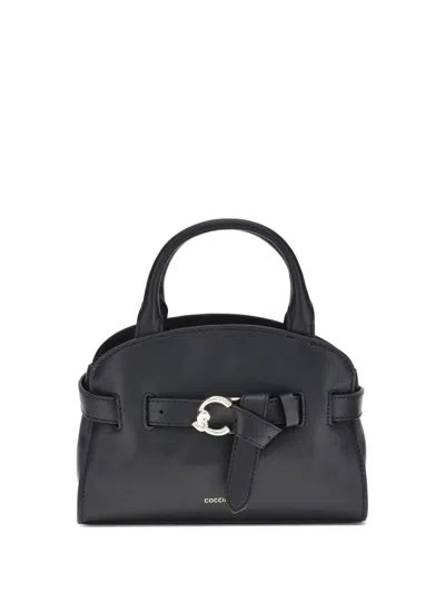 Coccinelle Handbags In Black