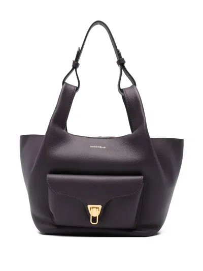 Coccinelle Knotted-handle Leather Shoulder Bag In Black