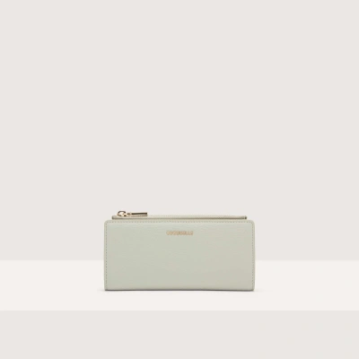 Coccinelle Large Grained Leather Wallet Metallic Soft In Celadon Green
