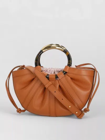 Coccinelle Leather Bucket Bag Tortoiseshell Handles Strap In Brown