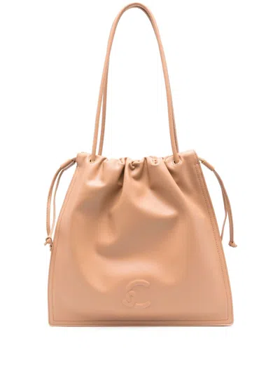 Coccinelle Logo Embossed Drawstring Tote Bag In Brown