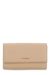 Coccinelle Logo Lettering Snap Buttoned Wallet In Beige
