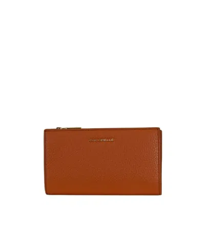 Coccinelle Logo Lettering Zipped Wallet In Brown