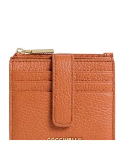 Coccinelle Logo Lettering Zipped Wallet In Orange