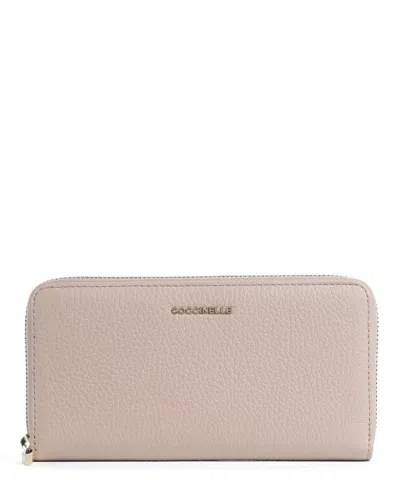 Coccinelle Logo Lettering Zipped Wallet In Pink