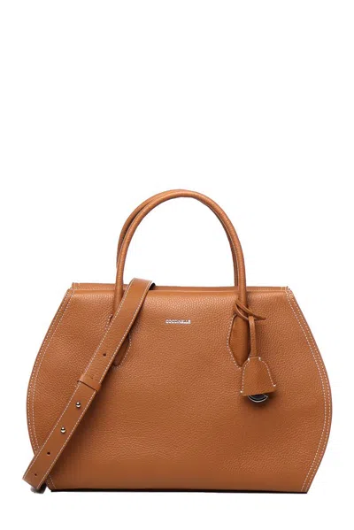 Coccinelle Lord Logo Printed Large Tote Bag In Brown