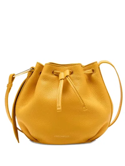 Coccinelle Malory Drawstring Mini Bag In Yellow