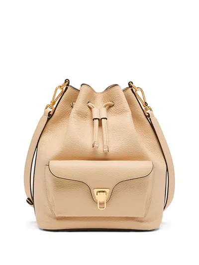 Coccinelle Medium Beat Bucket Bag In Neutral