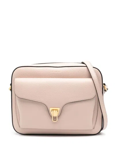 Coccinelle Medium Beat Cross Body Bag In 粉色