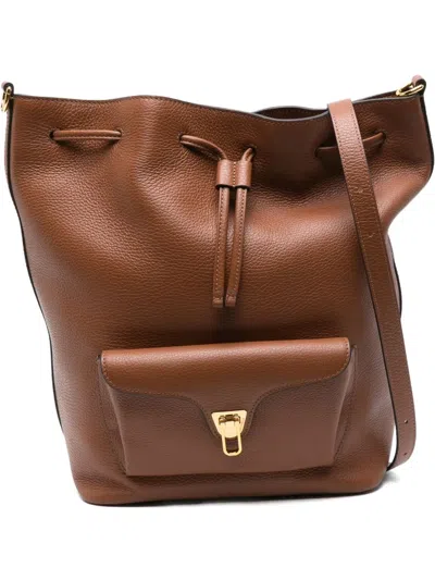 Coccinelle Medium Beat Generation Drawstring Bucket Bag In Brown