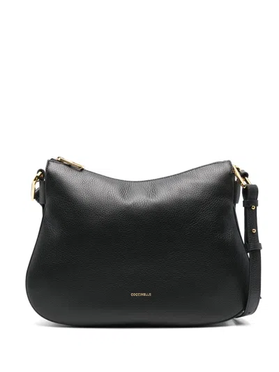 Coccinelle Medium Magie Cross Body Bag In Black