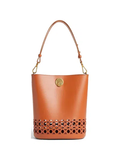 Coccinelle Medium Nikla Laser-cut Leather Shoulder Bag In Brown