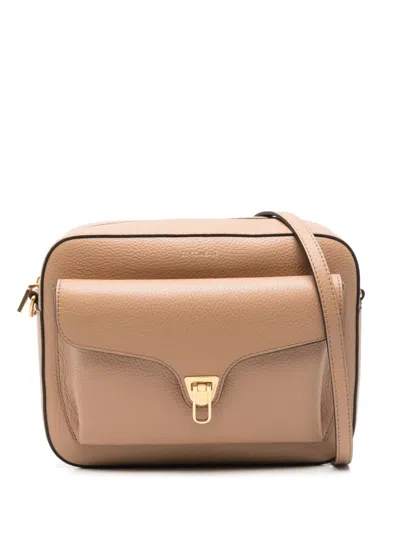 Coccinelle Medium Soft Beat Cross Body Bag In Neutrals