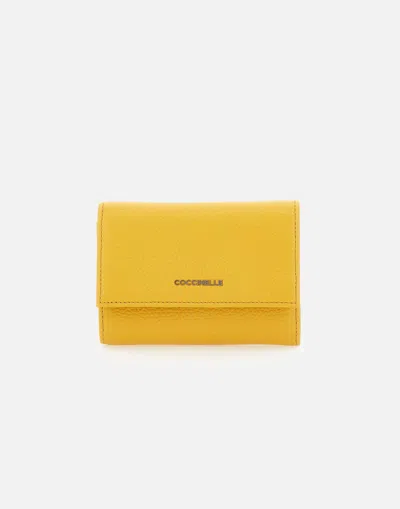 Coccinelle Metallic Soft Ocher In Yellow Wallet