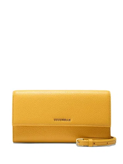Coccinelle Metallic Wallet In Yellow