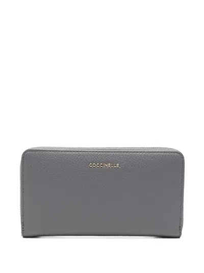 Coccinelle Pebbled Leather Wallet In Pink