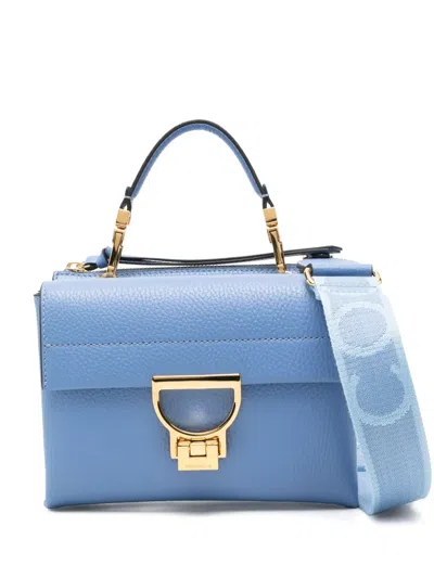 Coccinelle Small Arlettis Cross Body Bag In Blue