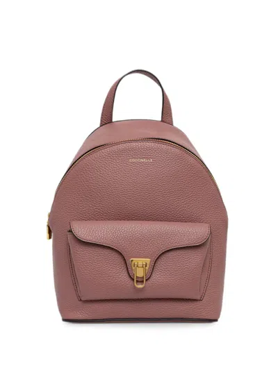 Coccinelle Small Beat Front-pocket Leather Backpack In Brown